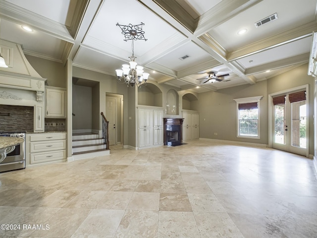 unfurnished living room with beamed ceiling, coffered ceiling, ceiling fan with notable chandelier, and crown molding