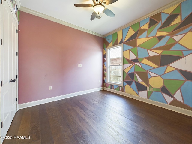 spare room with hardwood / wood-style flooring, ceiling fan, and ornamental molding