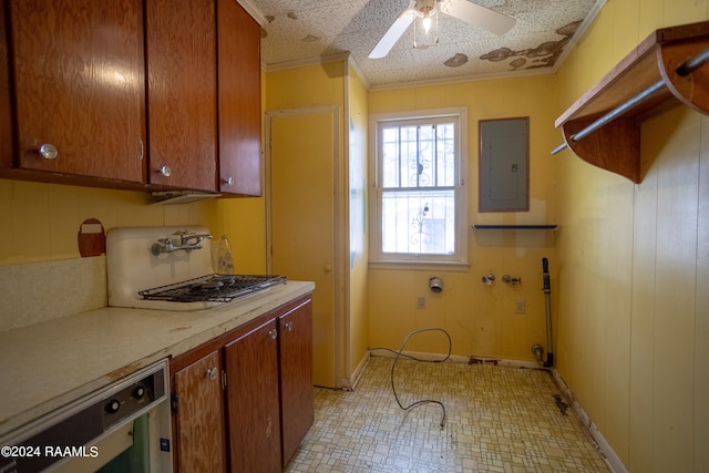 kitchen featuring light tile floors, ceiling fan, a textured ceiling, dishwasher, and sink