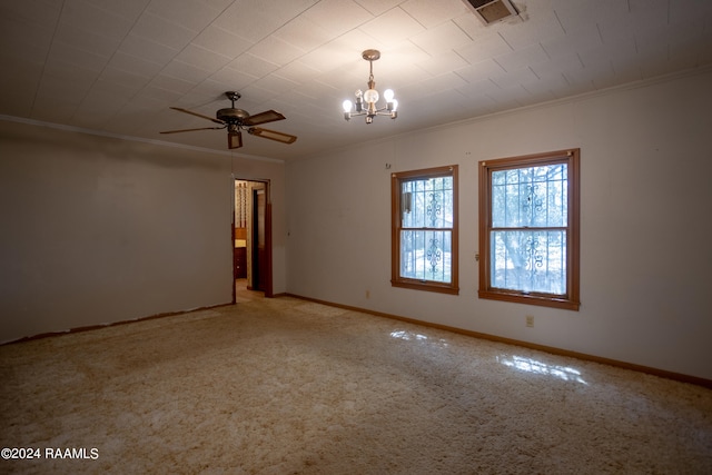 carpeted empty room with crown molding and ceiling fan with notable chandelier