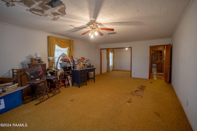 misc room featuring light colored carpet and ceiling fan