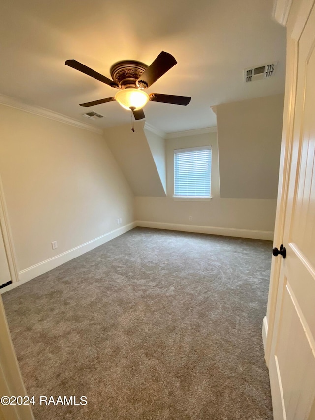 bonus room with carpet flooring, ceiling fan, and vaulted ceiling