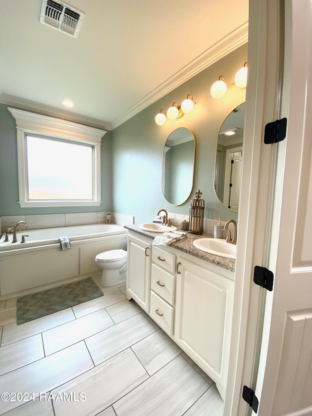 bathroom featuring toilet, tile patterned flooring, double vanity, a tub to relax in, and crown molding