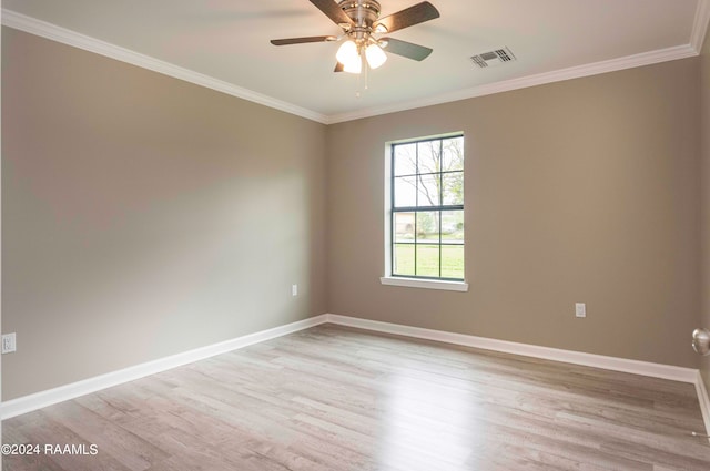 spare room with ceiling fan, crown molding, and light hardwood / wood-style flooring