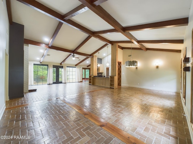 unfurnished living room with french doors, high vaulted ceiling, beam ceiling, and ceiling fan