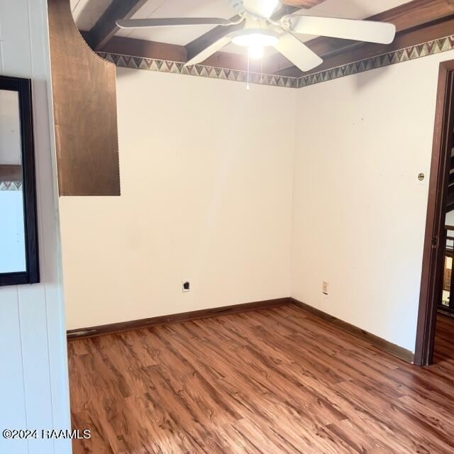 empty room featuring hardwood / wood-style flooring and ceiling fan