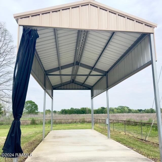 view of patio / terrace with a carport