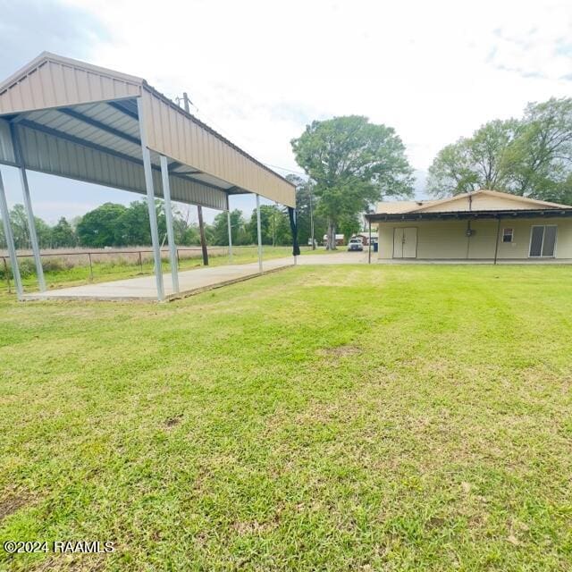 view of yard featuring a carport