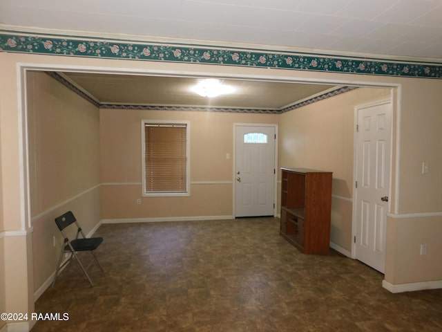 interior space featuring dark tile floors