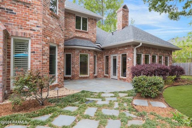 back of house featuring a patio