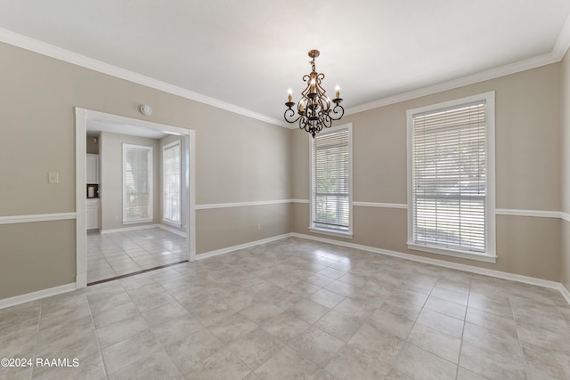 tiled empty room featuring crown molding and a notable chandelier