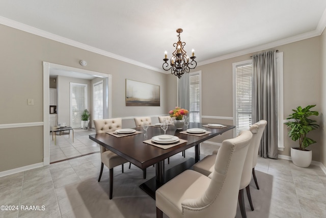 tiled dining area with a notable chandelier and ornamental molding