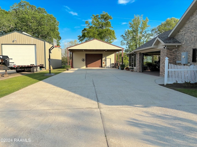 exterior space with an outdoor structure and a garage