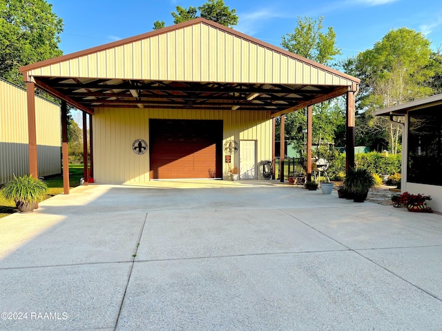 garage featuring a carport