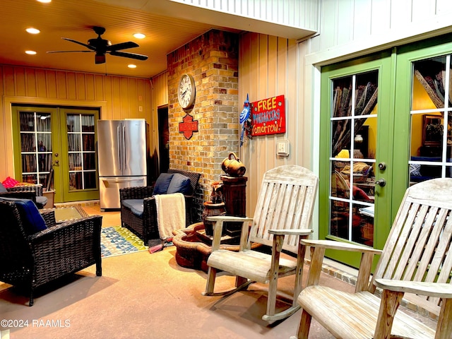 view of patio with french doors and ceiling fan