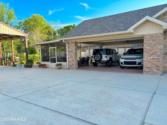 view of vehicle parking featuring a carport