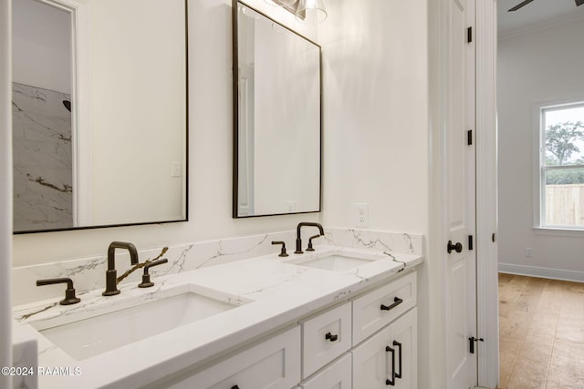 bathroom featuring vanity and hardwood / wood-style flooring