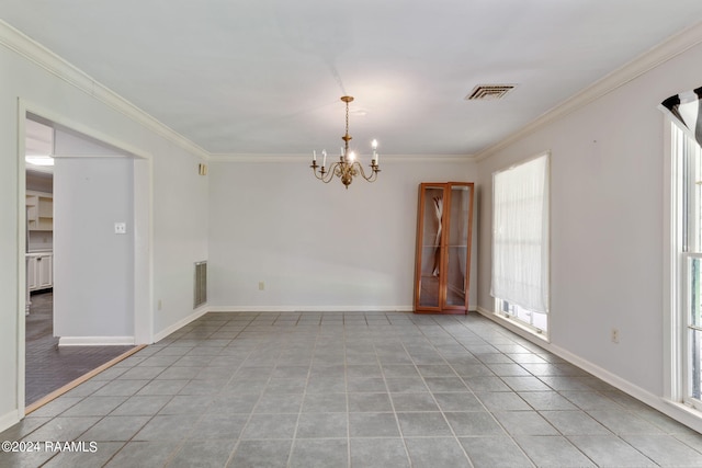 tiled empty room with ornamental molding and an inviting chandelier