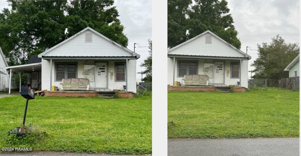 view of front facade with a porch and a front lawn