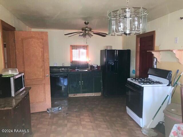 kitchen featuring black refrigerator with ice dispenser, dark parquet flooring, white range with gas cooktop, dishwasher, and ceiling fan with notable chandelier