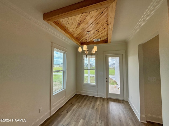 doorway to outside with wood ceiling, hardwood / wood-style floors, a notable chandelier, and ornamental molding