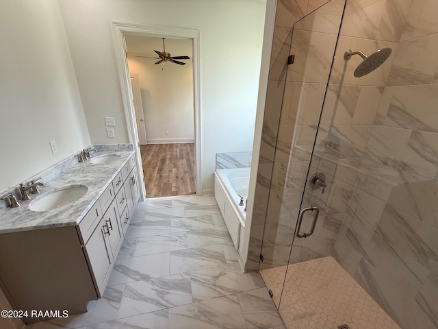 bathroom with ceiling fan, vanity, shower with separate bathtub, and wood-type flooring