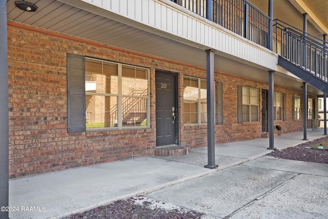 doorway to property with a balcony