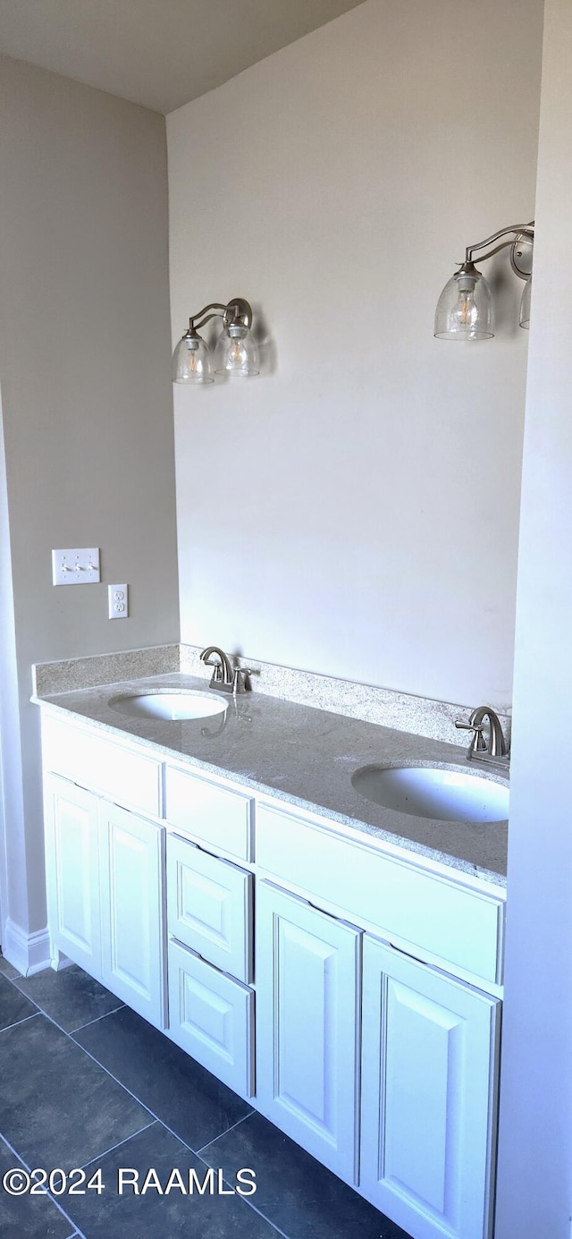 bathroom featuring vanity and tile patterned floors