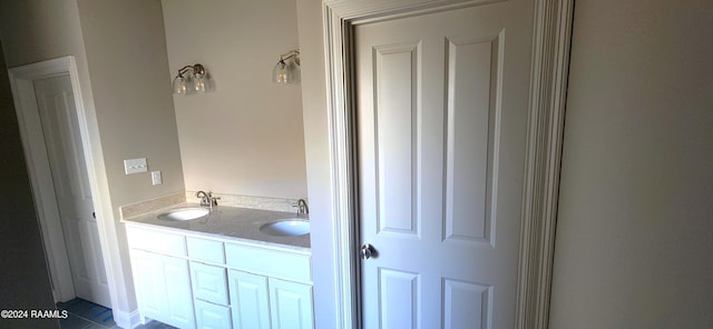 bathroom with vanity and tile patterned floors