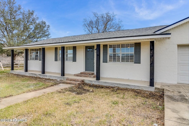 single story home with a garage