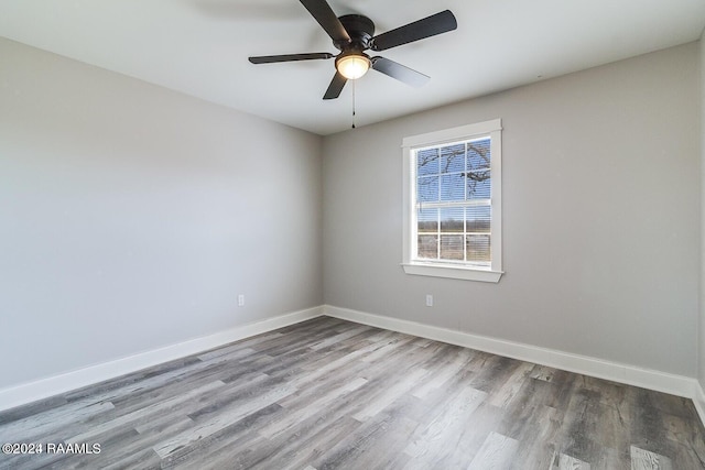 unfurnished room featuring ceiling fan and hardwood / wood-style flooring