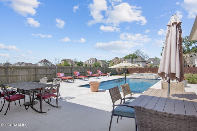 view of swimming pool featuring a patio