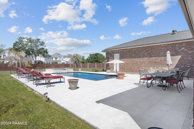 view of pool featuring a patio area