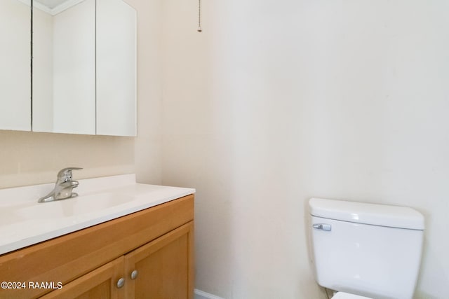 bathroom with oversized vanity and toilet