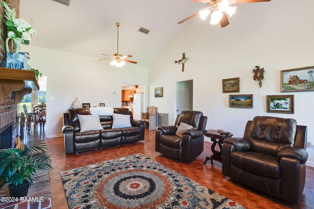 living room featuring high vaulted ceiling, a brick fireplace, and ceiling fan