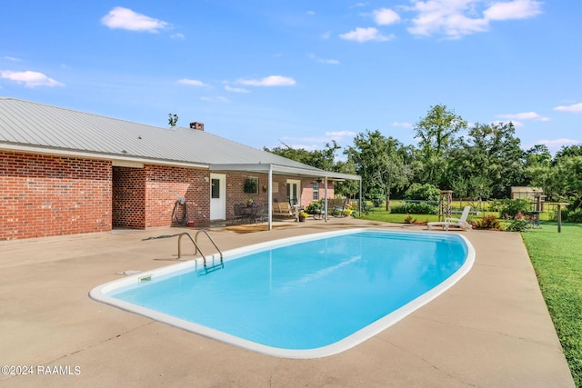 view of pool with a patio