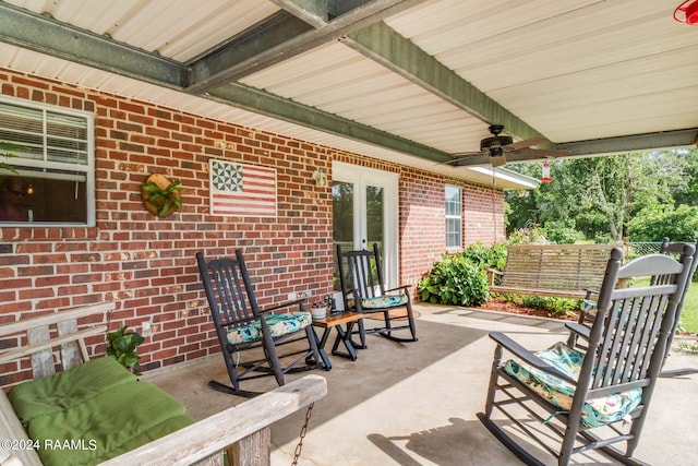 view of patio featuring ceiling fan