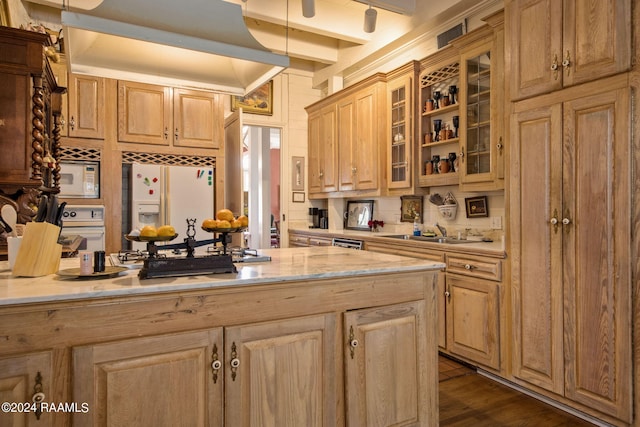 kitchen with beamed ceiling, oven, dark hardwood / wood-style floors, built in microwave, and white refrigerator with ice dispenser