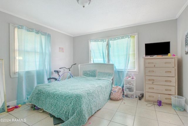 bedroom featuring light tile flooring and crown molding