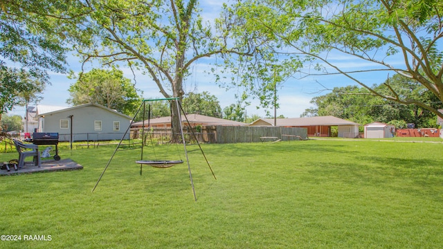 view of yard featuring a storage shed