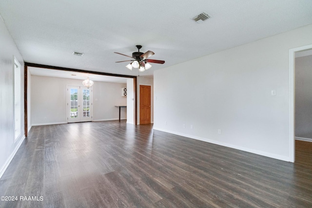 unfurnished room featuring french doors, dark hardwood / wood-style flooring, ceiling fan, and a textured ceiling