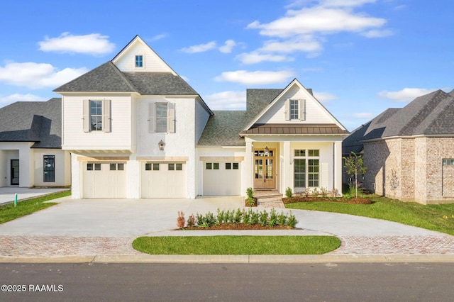 view of front of home with a garage