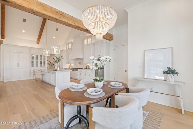 225 Gunter Grass Ct, Lafayette, LA 70508 - dining room featuring stairway, light wood-type flooring, high vaulted ceiling, a chandelier, and beam ceiling