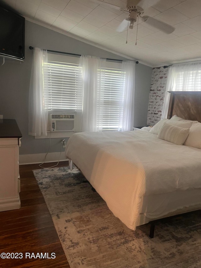 bedroom with ornamental molding, ceiling fan, dark hardwood / wood-style floors, and multiple windows