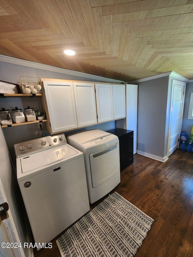 laundry area with cabinets, washing machine and clothes dryer, wood ceiling, dark hardwood / wood-style flooring, and crown molding