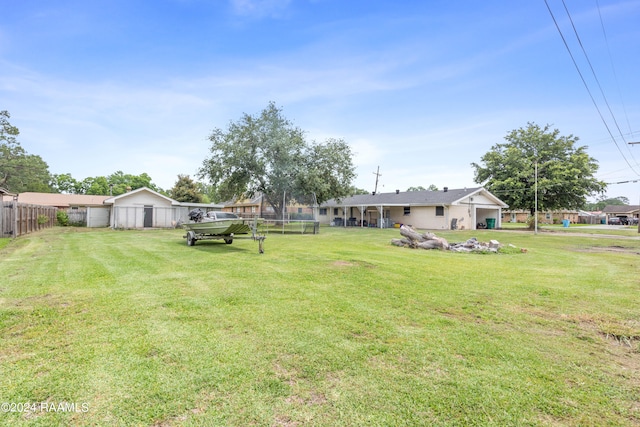 view of yard featuring a garage