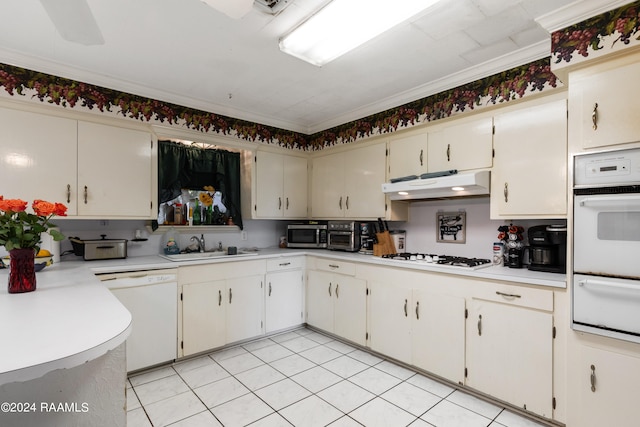 kitchen with sink, ornamental molding, white appliances, and light tile flooring