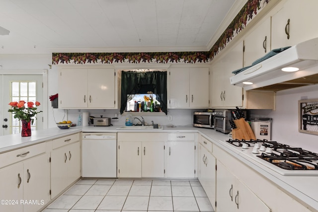 kitchen with white cabinetry, white appliances, sink, light tile flooring, and custom exhaust hood