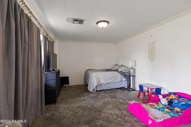 bedroom featuring crown molding