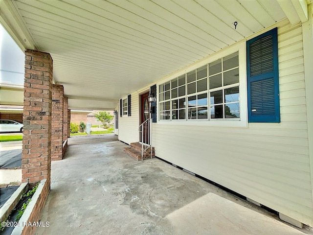 view of terrace featuring covered porch